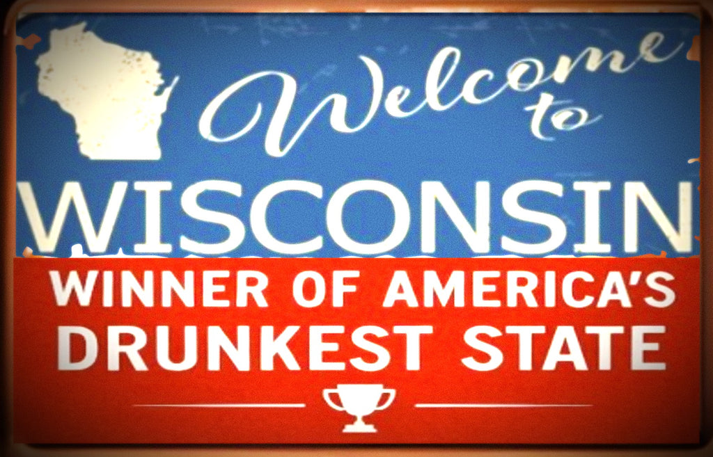Sign with 'Welcome to Wisconsin, Winner of America's Drunkest State' text on a blue and red background.